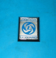 PAIR - BRITISH LEYLAND BADGE BLUE ON SILVER FRONT GUARD MGB 1972 > - INCLUDES DELIVERY
